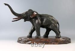 Éléphant en bronze de l'époque Meiji du Japon sur son support