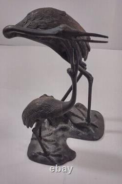 Paire de sculptures en bronze de style Meiji japonais du début du 20ème siècle