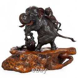 Très belle sculpture en bronze japonaise de l'ère Meiji représentant un éléphant et des tigres par Mitsumoto.